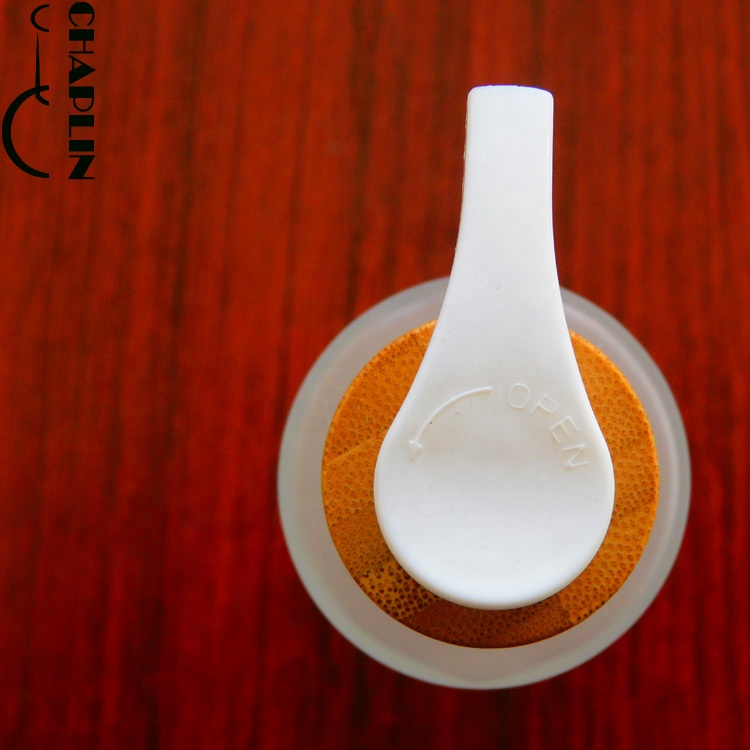 round pump wood lid cosmetic glass bottle matte Bottle With Bamboo Spray