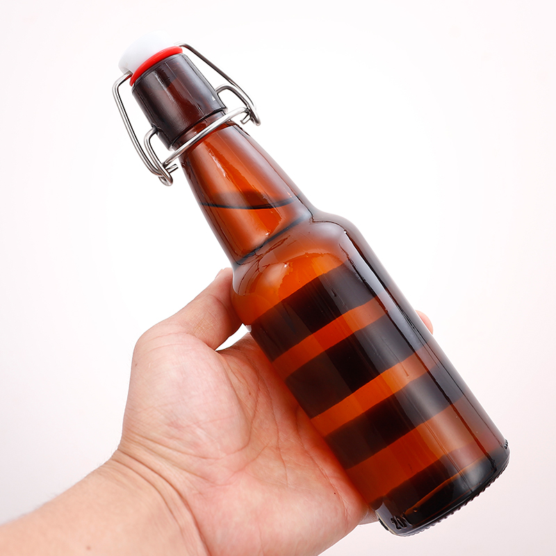 round snap amber glass bottle with swing top for beer