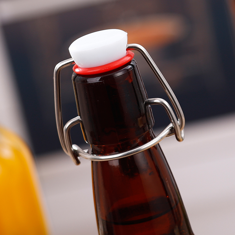 round snap amber glass bottle with swing top for beer