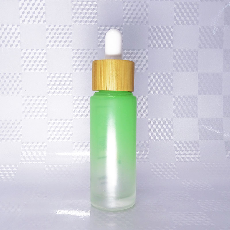 screen printing amber frosted glass essential oil bottle with bamboo dropper and bamboo pump