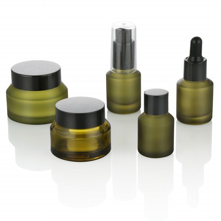 skin care package frosted green glass cream jar with matte black plastic lid 5g 15g 30g 50g