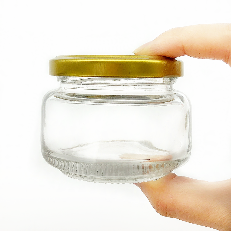 small 100ml round clear glass jar for caviar with metal lid