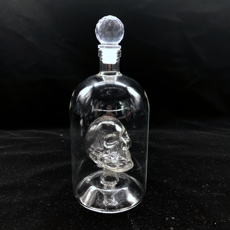 small 750ml whisky bottle with wooden corks