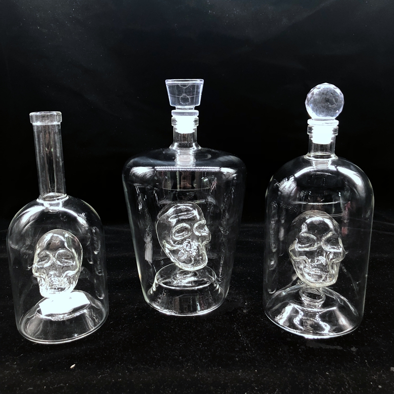 small 750ml whisky bottle with wooden corks