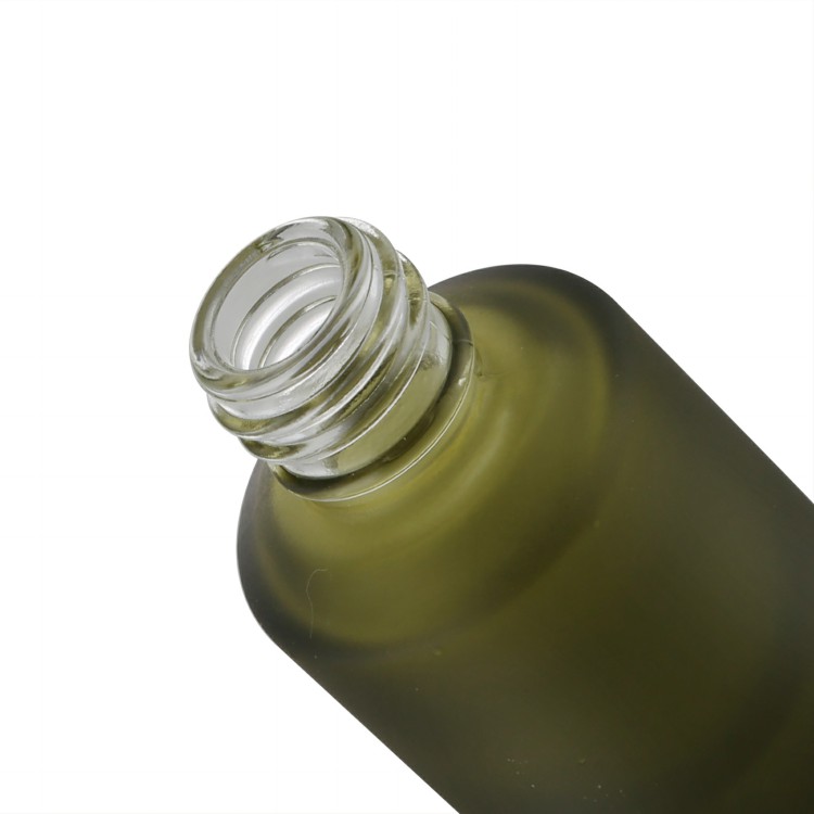 small capacity cosmetic packaging frosted green glass bottle with pump 15 ml plastic cap