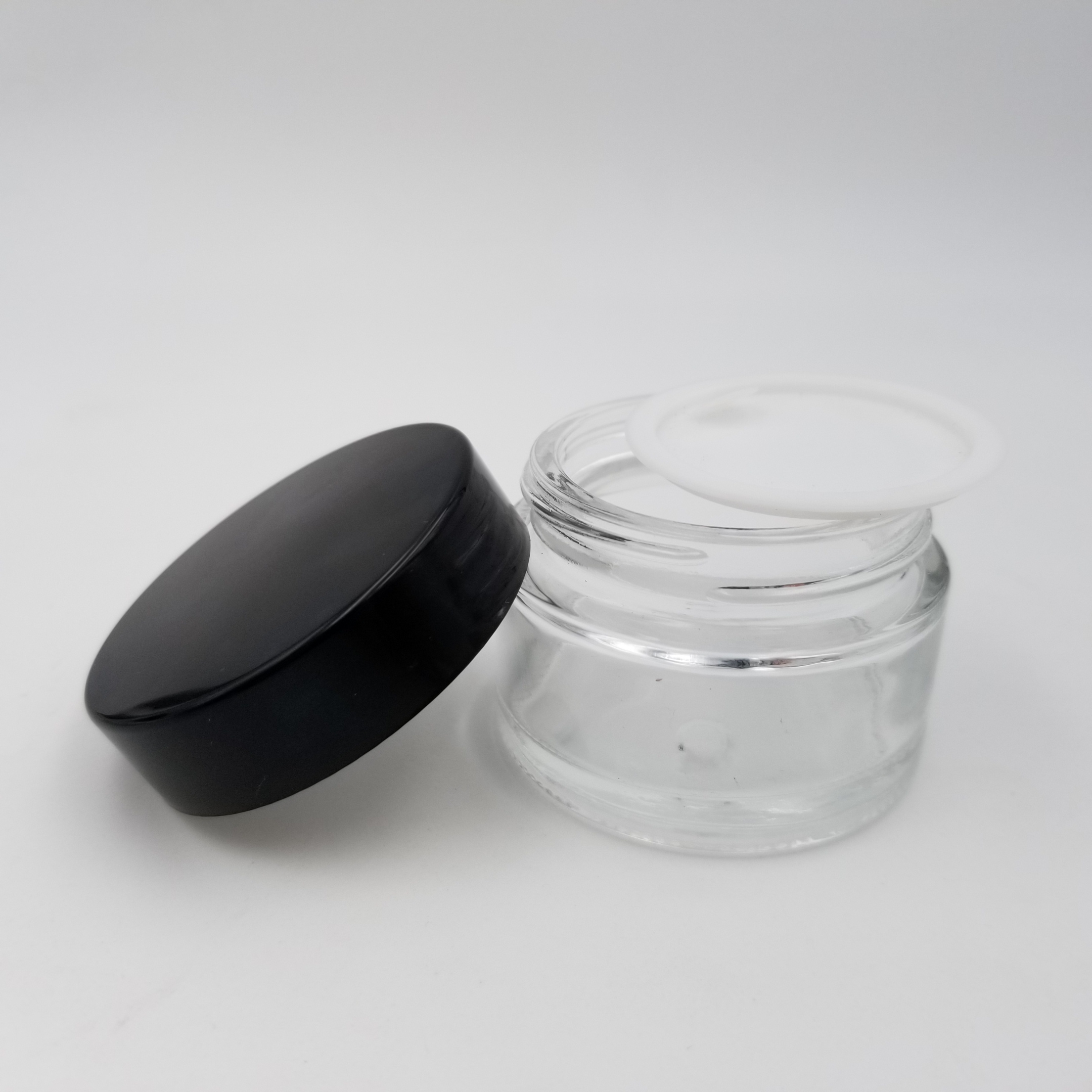 small cosmetic cream round frosted clear 30ml 1 oz glass jar with black sliver aluminum screw top lid