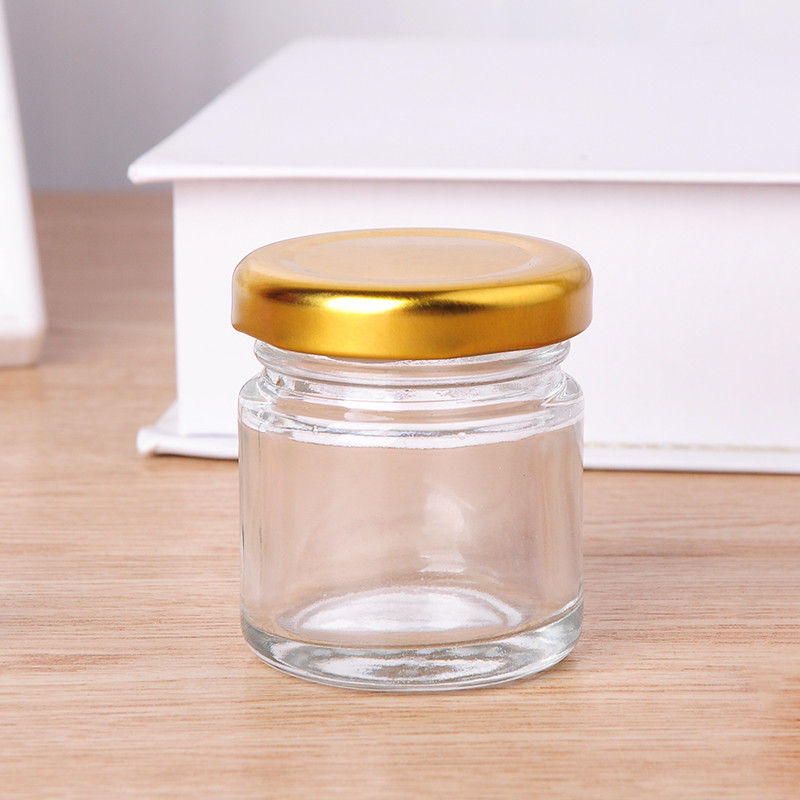 small empty 35ml glass honey jar jam jar with metal lid