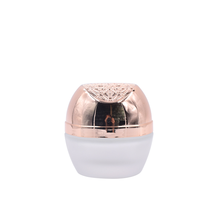 special design 60g 40ml 100ml 120ml care packaging cosmetic clear storage glass cosmetic bottle ang jars with rose gold lid