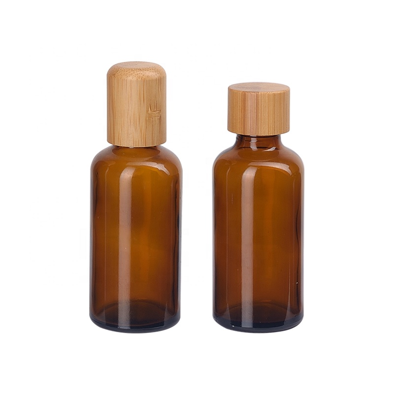 stock and wholesale 50ml amber glass bottle essential oil drop plug glass bottle with bamboo cap
