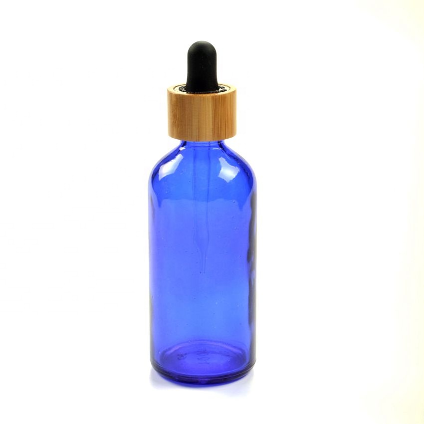 stock and wholesale black silicone rubber crc child-proof bamboo cap bottles essential oil glass 100ml dropper bottle