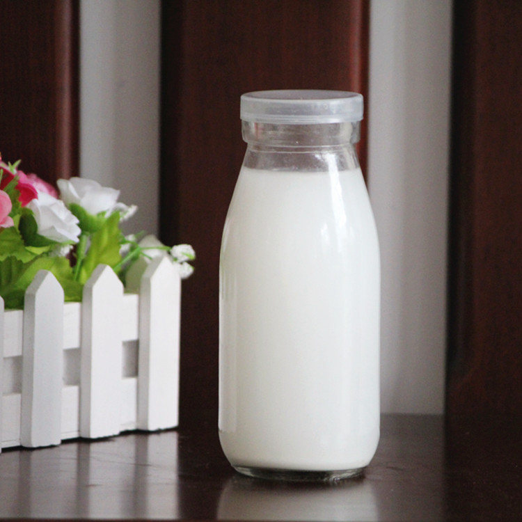 supplier 100ml-1000ml milk glass bottle with plastic cap wholesale