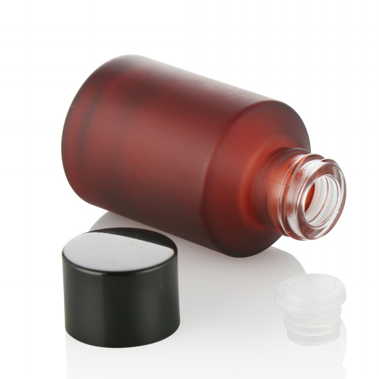 top quality elegant 60ml 125lml 200ml top quality boutique packaging glass bottles for skin liquor lotion with black cap