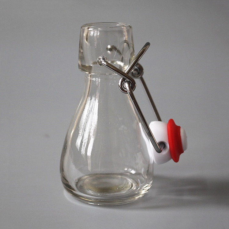 transparent 50ml empty glass bottle for juice with swing top clip lid