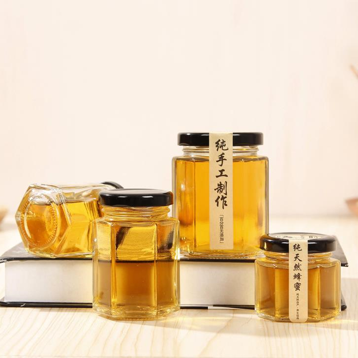 transparent empty honey glass jar hexagonal glass jar with leak proof tin lid