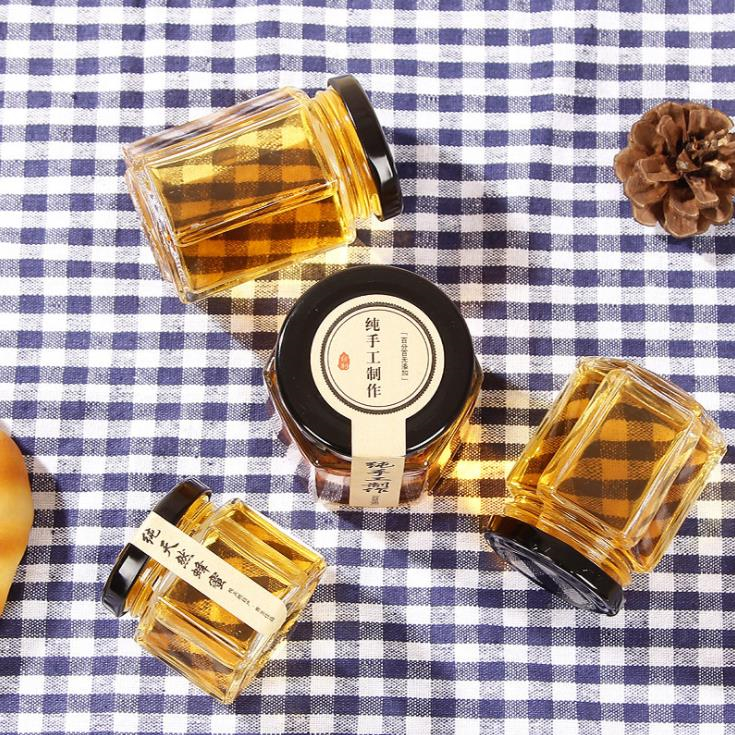 transparent empty honey glass jar hexagonal glass jar with leak proof tin lid