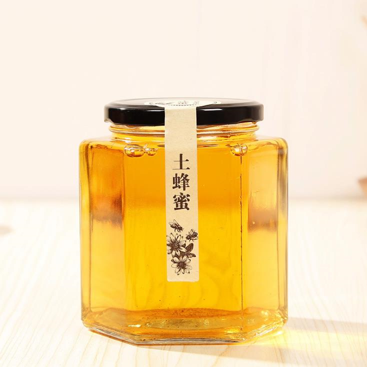 transparent empty honey glass jar hexagonal glass jar with leak proof tin lid