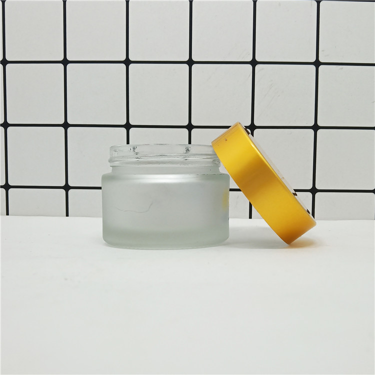 transparent glass cosmetic packaging 100 ml glass jar with lid