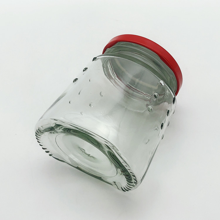 unique shape 200ml clear glass candy jar with metal lug cap