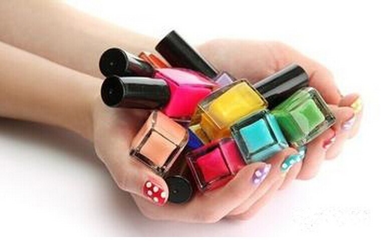 various empty glass nail polish bottles