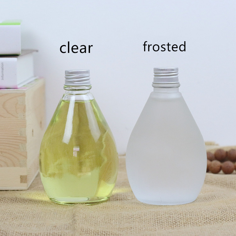 water droplets shape 280ml 350ml 500ml clear or frosted glass beverage bottle with screw cap
