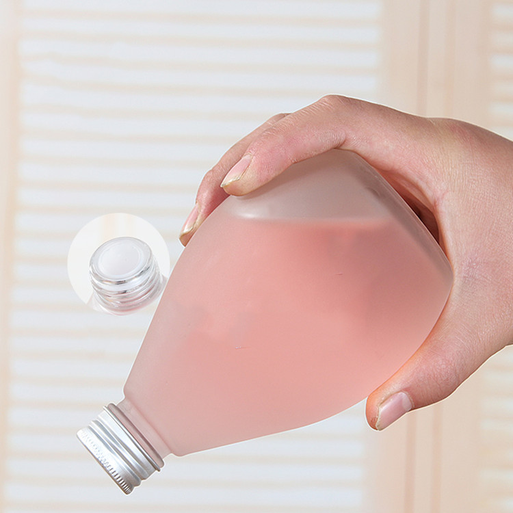 water droplets shape 280ml 350ml 500ml clear or frosted glass beverage bottle with screw cap