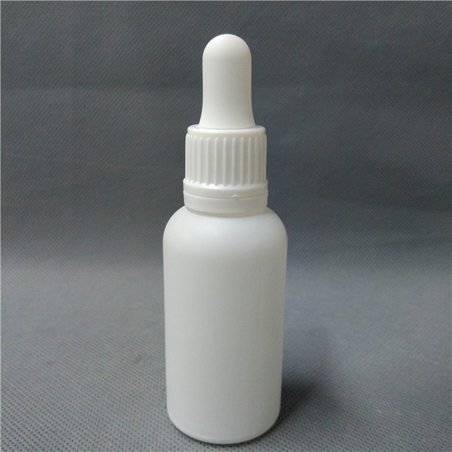 white frosted round 30 ml glass dropper bottle with tamper evident droppers