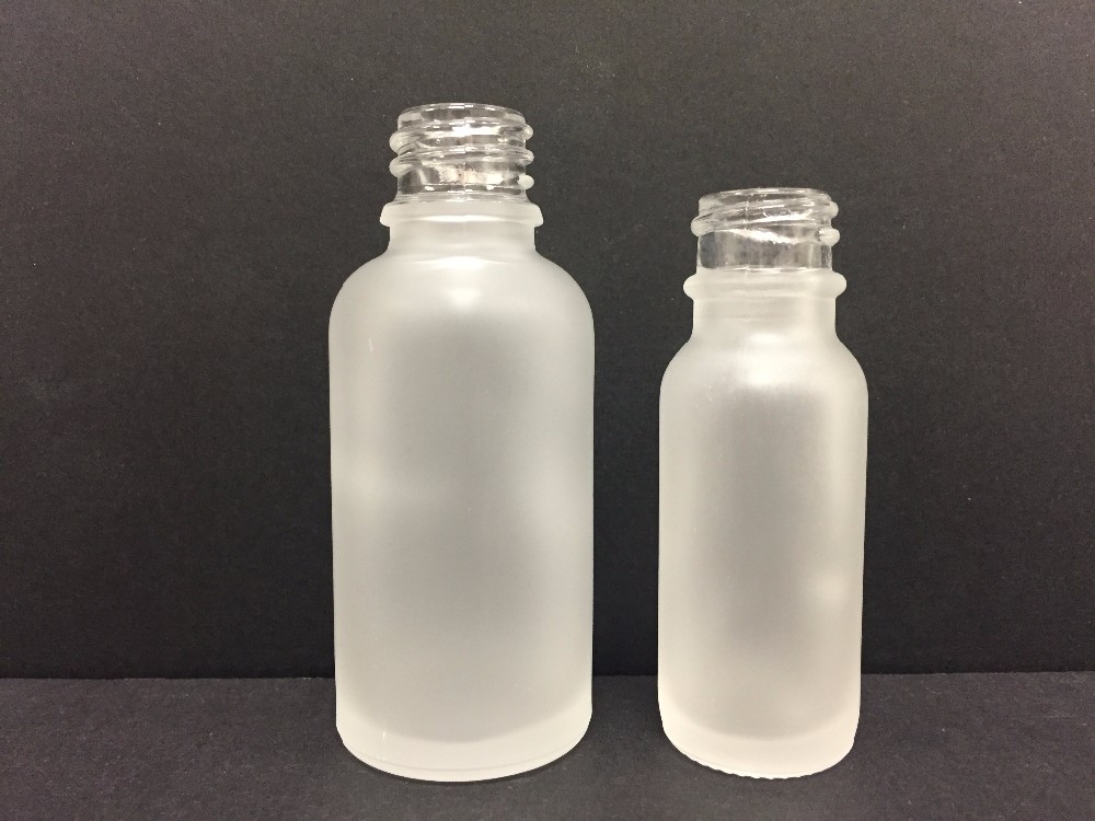 white frosted round 30 ml glass dropper bottle with tamper evident droppers
