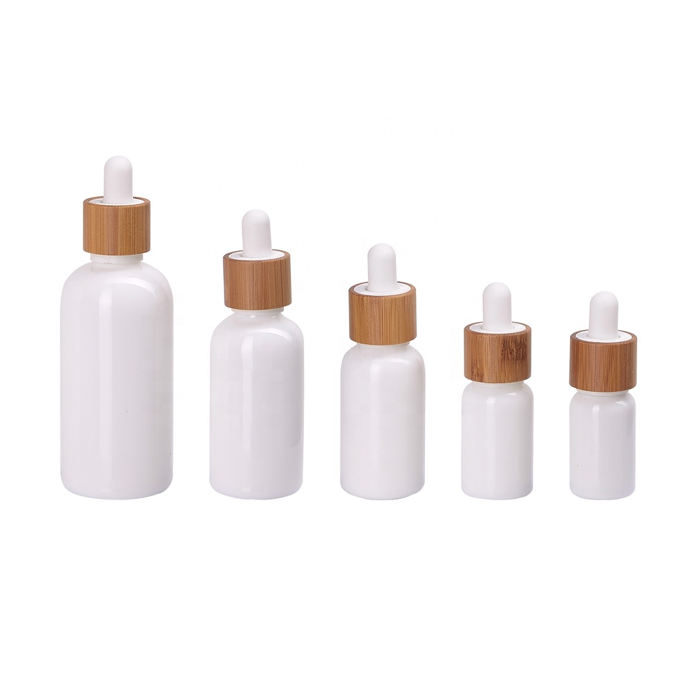 white glass 30ml 50ml 100ml essential oil bottle CRC child resistant tamper proof plastic bamboo glass dropper white bottle
