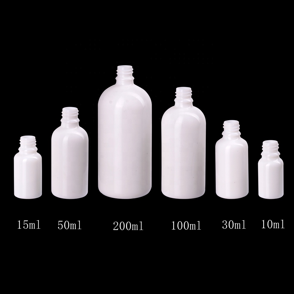 white glass 30ml 50ml 100ml essential oil bottle CRC child resistant tamper proof plastic bamboo glass dropper white bottle