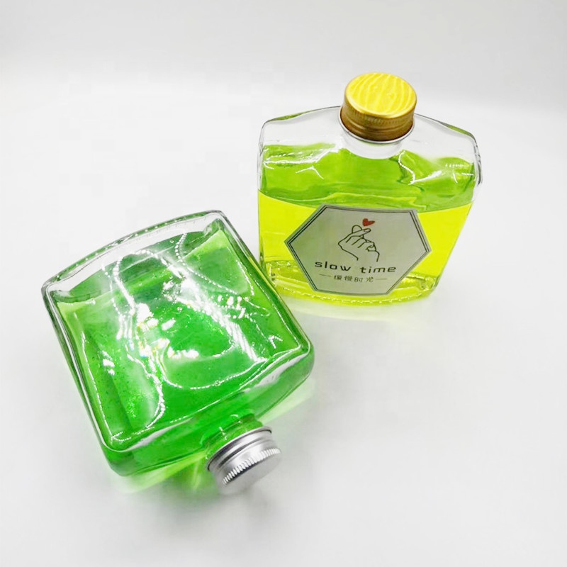 wholesale 100 ml 250 ml flat shape juice glass bottle with screw cap milk tea cold brew tea coffee glass bottle