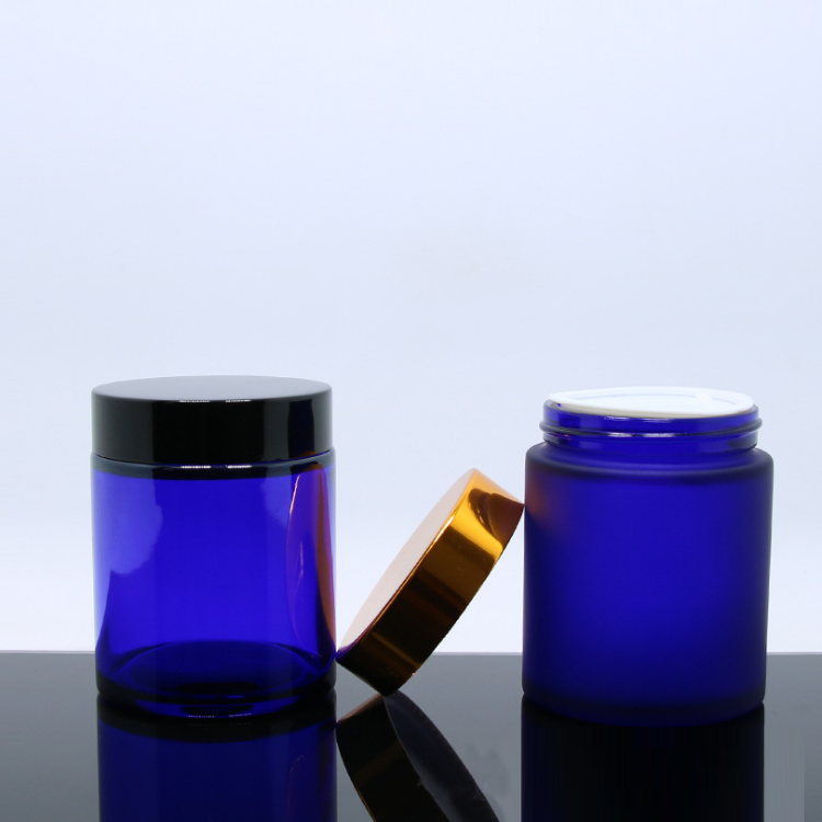 wholesale 100g round natural Cobalt blue glass cosmetic cream jar with inner seal and black gold cap
