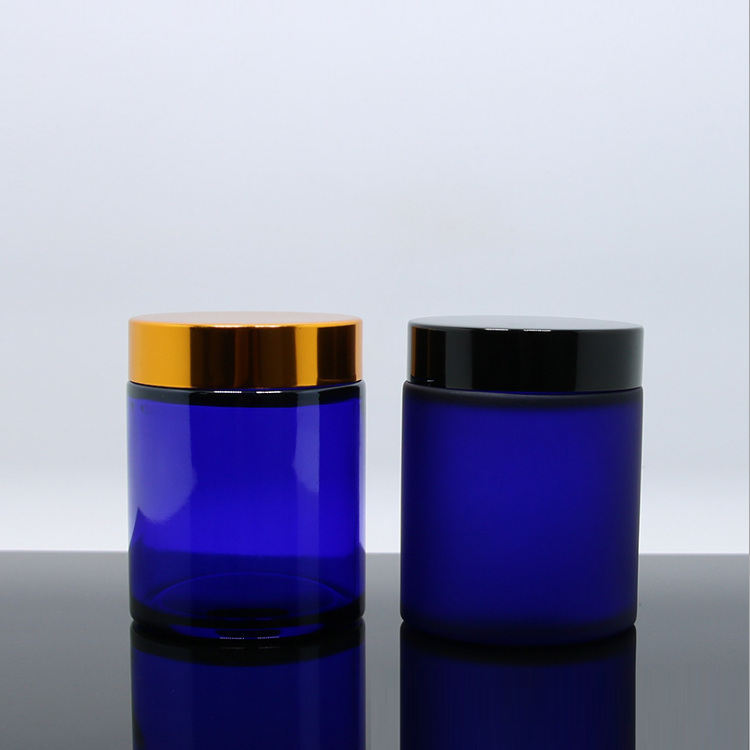 wholesale 100g round natural Cobalt blue glass cosmetic cream jar with inner seal and black gold cap