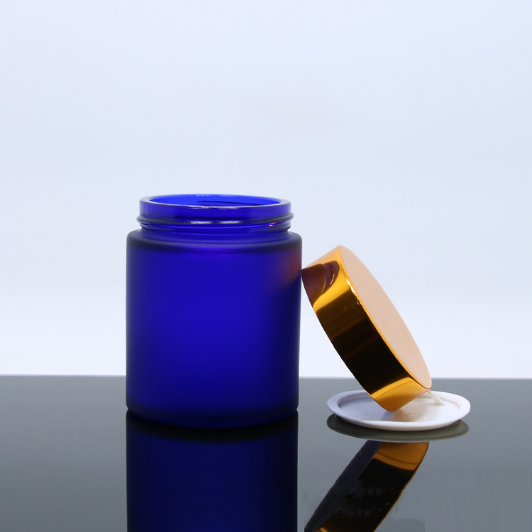 wholesale 100g round natural Cobalt blue glass cosmetic cream jar with inner seal and black gold cap