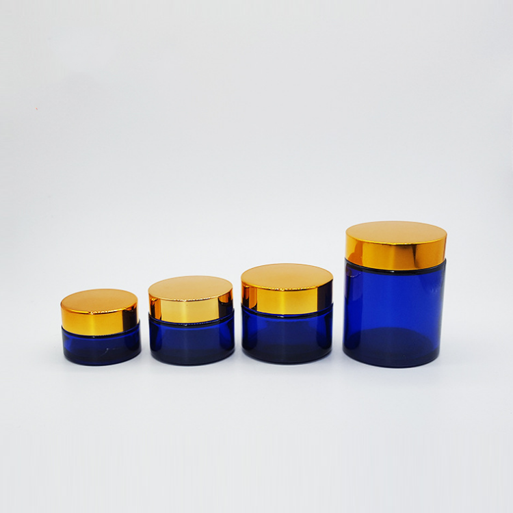 wholesale 100g round natural Cobalt blue glass cosmetic cream jar with inner seal and black gold cap