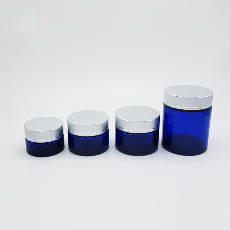 wholesale 100g round natural Cobalt blue glass cosmetic cream jar with inner seal and black gold cap