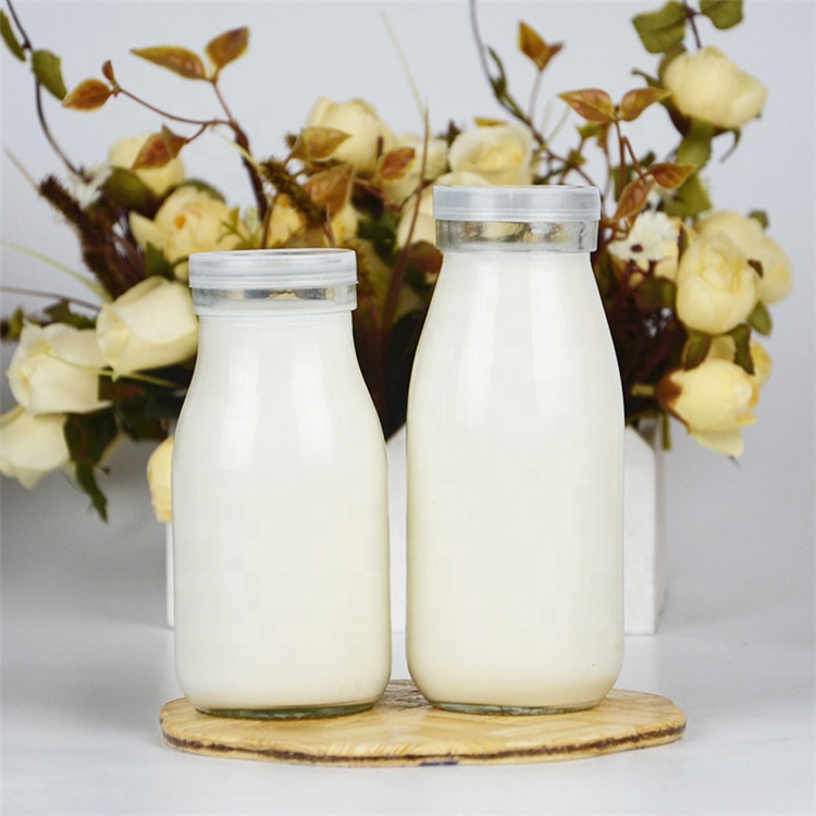wholesale 100ml 200ml 250ml 500ml milk beverage juice glass bottle with plastic cap