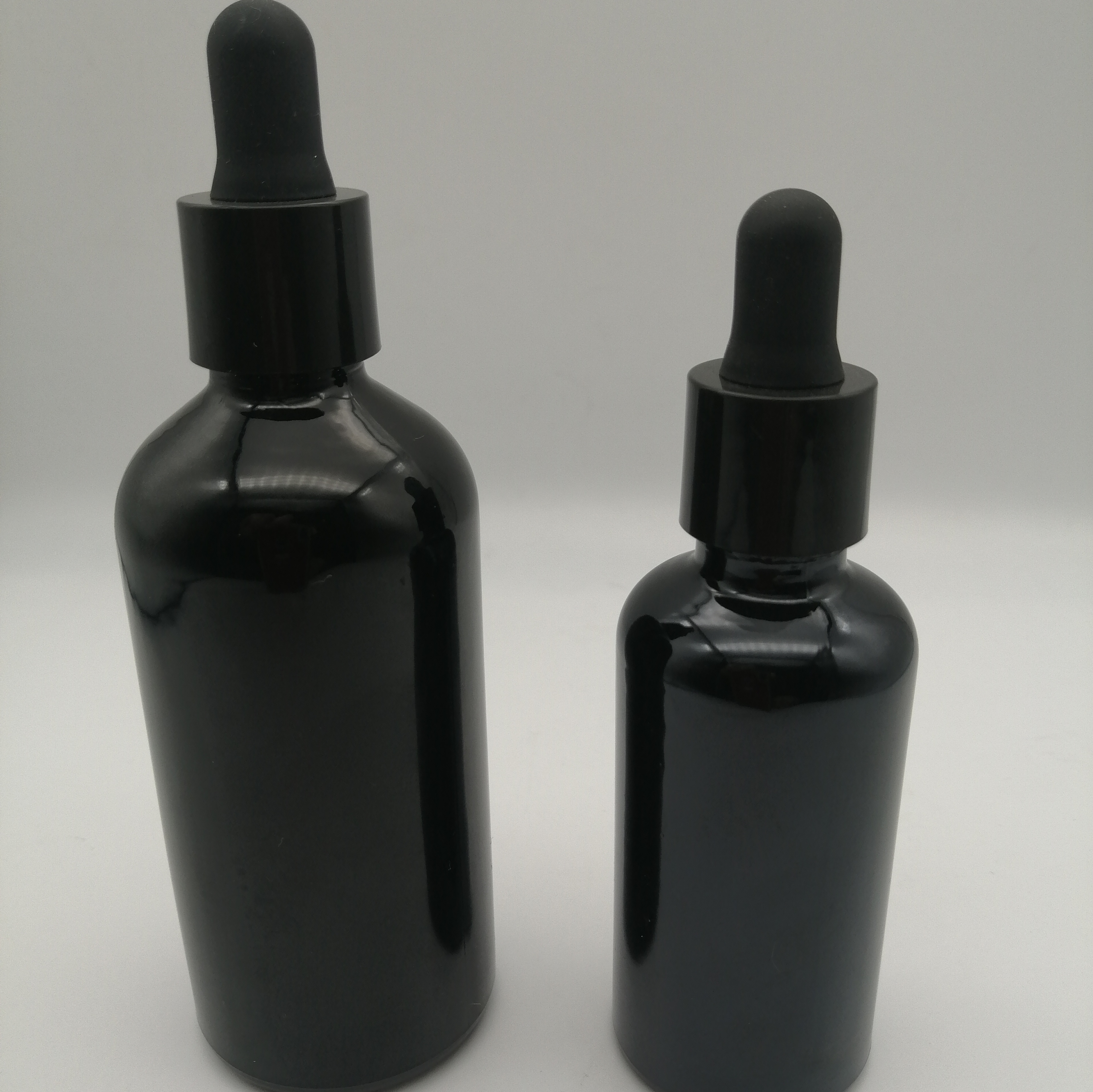 wholesale 100ml shiny black dropper glass bottle with black metal cap dropper container glass
