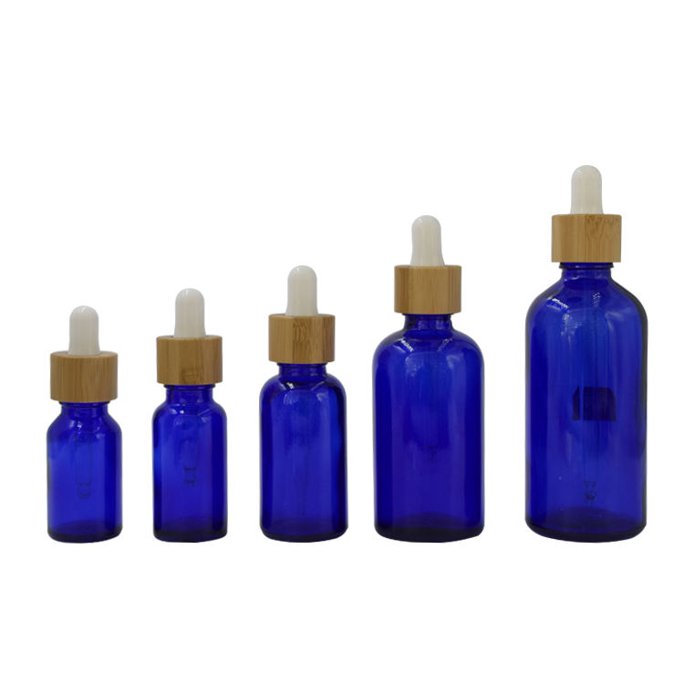 wholesale 10ml 15ml 20ml 30ml 50ml 100ml matte frosted white essential oil glass bottle with bamboo dropper cap