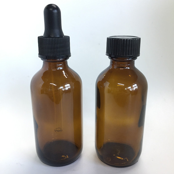 wholesale 2 oz amber glass cosmetic bottle with aluminium cream pump