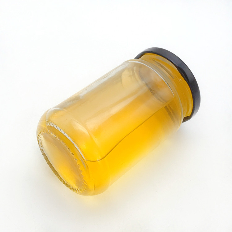 wholesale 200 ml transparent round glass jar for jam with metal cap