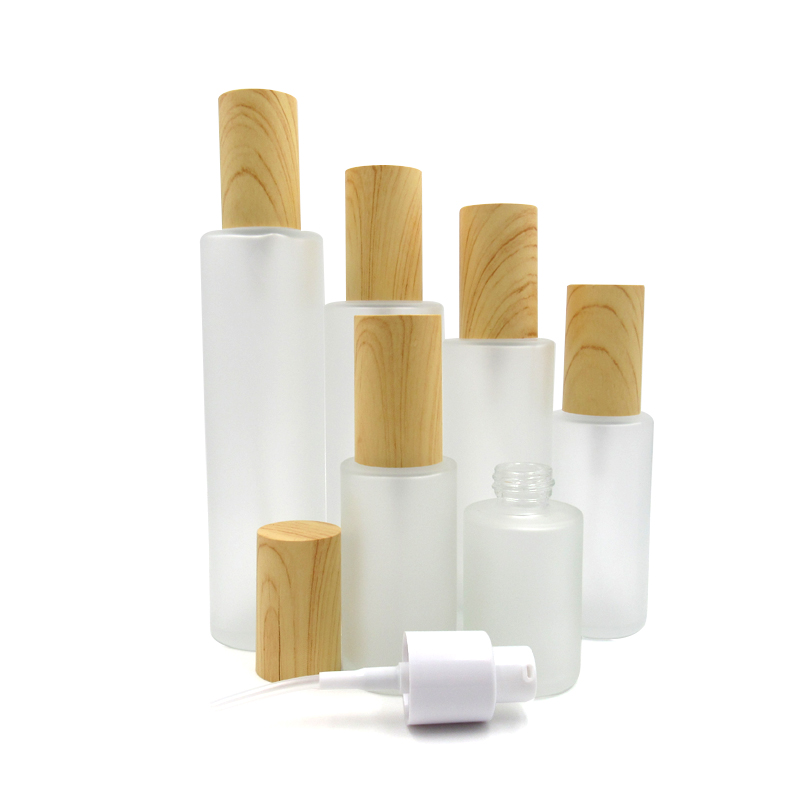 wholesale 20ml 30ml 50ml 80ml100ml 120ml frosted glass empty cosmetic Packaging pump serum perfume bottles with wood lids