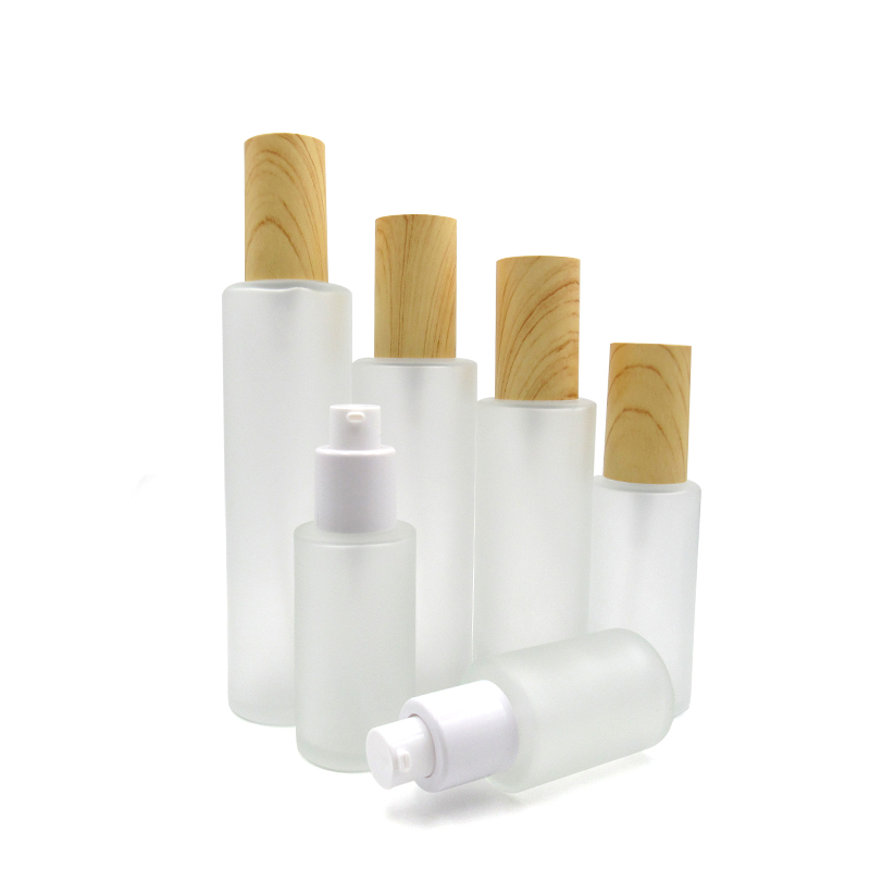 wholesale 20ml 30ml 50ml 80ml100ml 120ml frosted glass empty cosmetic Packaging pump serum perfume bottles with wood lids