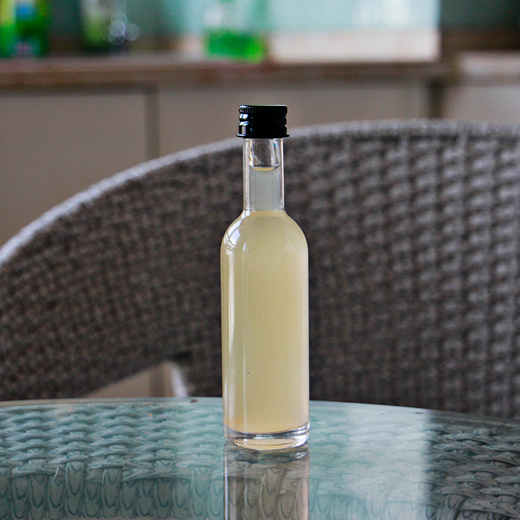 wholesale 3 oz 100ml round glass bottle clear vodka bottles with screw Lid