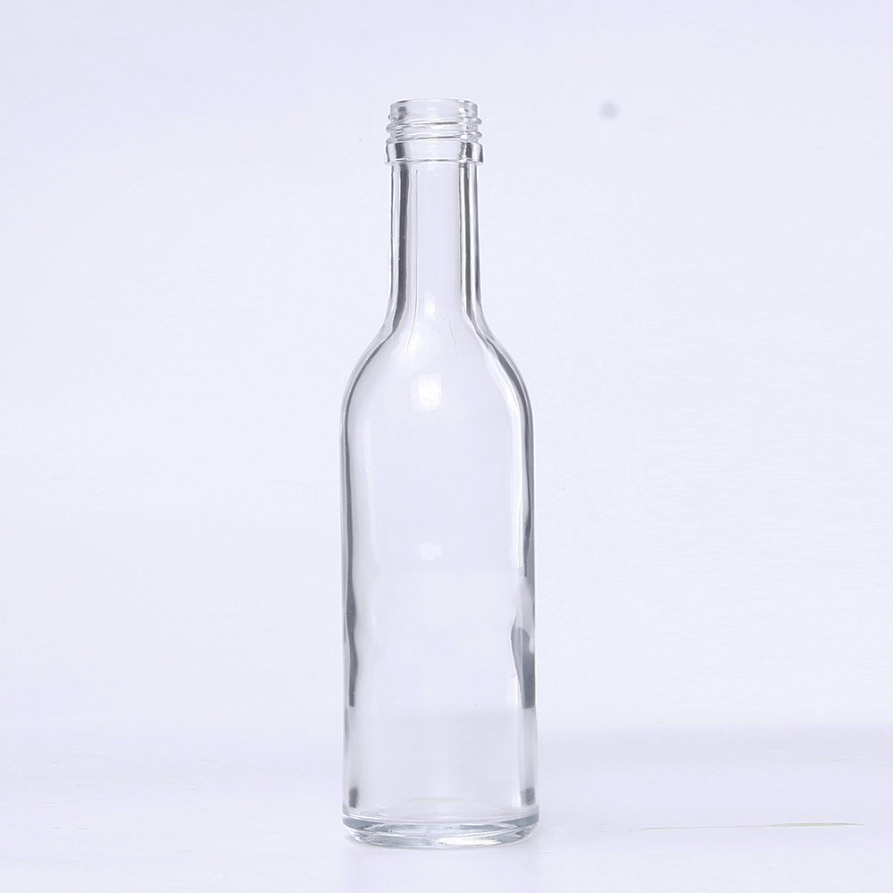 wholesale 3 oz 100ml round glass bottle clear vodka bottles with screw Lid