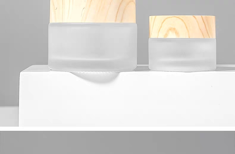 wholesale 30g frosted cosmetic skincare eye cream glass jar with Wood grain plastic cover