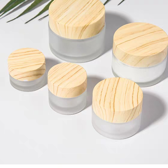 wholesale 30g frosted cosmetic skincare eye cream glass jar with Wood grain plastic cover