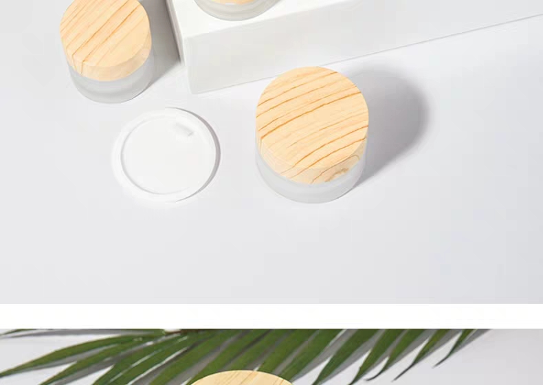 wholesale 30g frosted cosmetic skincare eye cream glass jar with Wood grain plastic cover