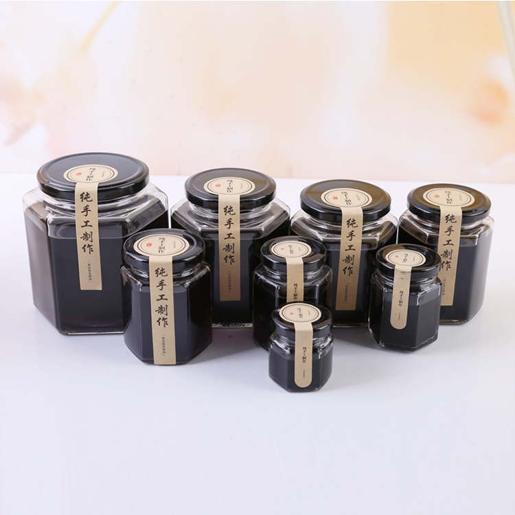 wholesale 30ml 50ml 100ml 250ml 500ml hexagon glass jar with cap for honey for food
