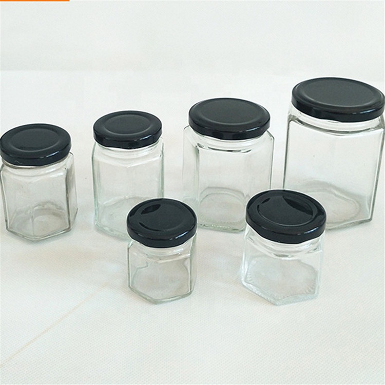 wholesale 30ml 50ml 100ml 250ml 500ml hexagon glass jar with cap for honey for food