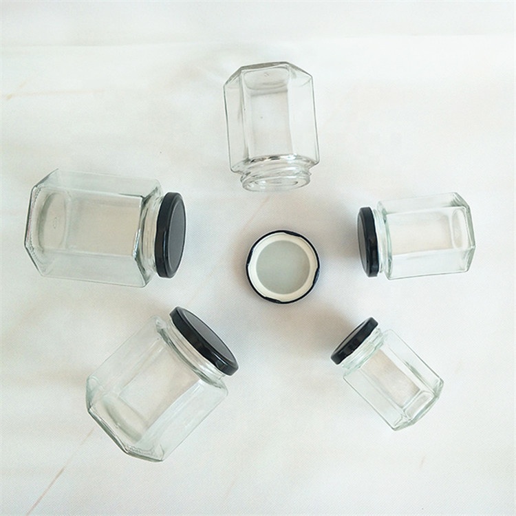 wholesale 30ml 50ml 100ml 250ml 500ml hexagon glass jar with cap for honey for food